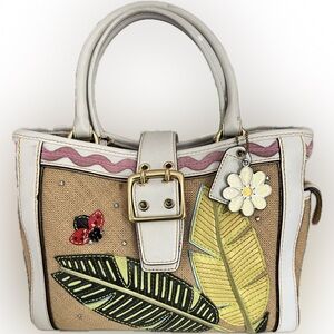 EUC COACH handbag in "Lady Bug Leaf"
Limited Edition.